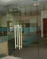 扬州【庆亚】商场店铺地弹簧钢化玻璃门制作安装一平米多少钱